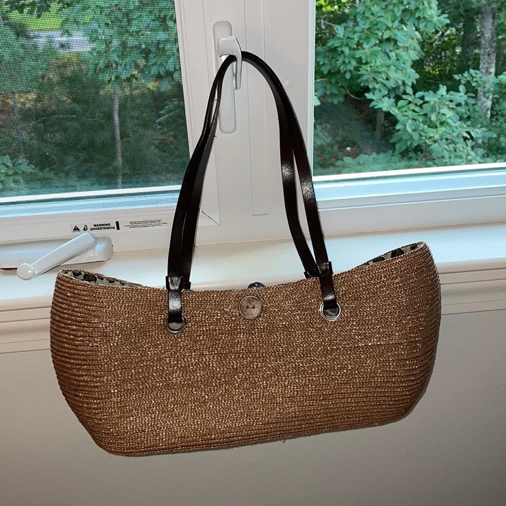Woven bag with leather straps